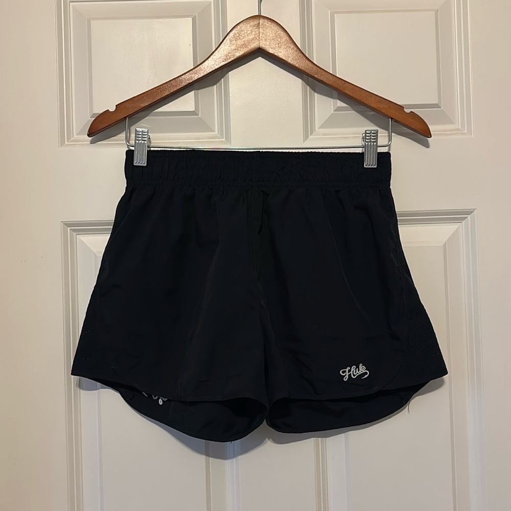 Black Huk shorts.